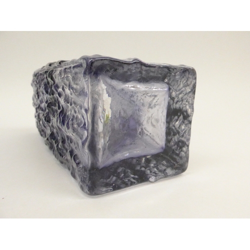 7289 - An Ingrid Morche Glass amethyst vase, square form with bark texture.  22cm high