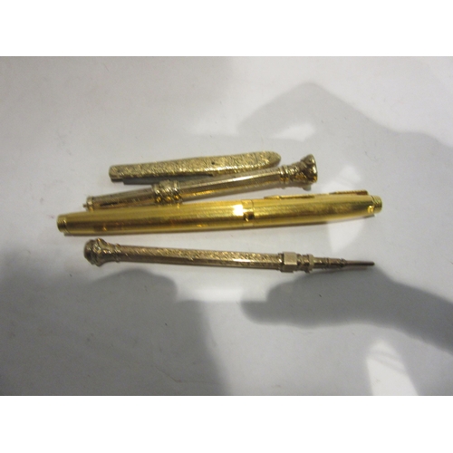 4391 - A Parker fountain pen with 585 gold nib, plated body, engraved pen-knife and two propelling pencils.... 