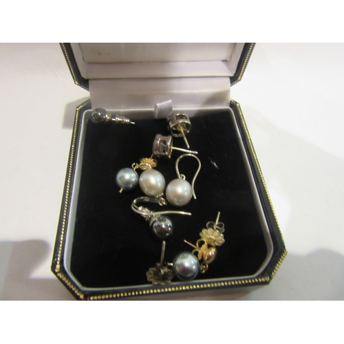 4392 - A selection of earrings including south sea pearls