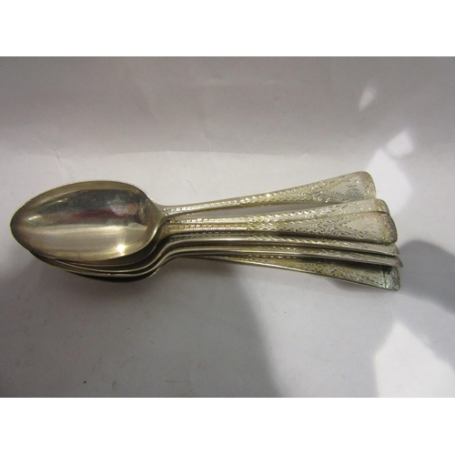 4417 - A set of six silver teaspoons bright cut monogrammed finials, London