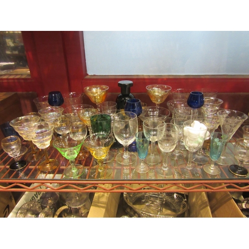 4476 - A collection of various glassware, coloured glasses, etched glass, etc