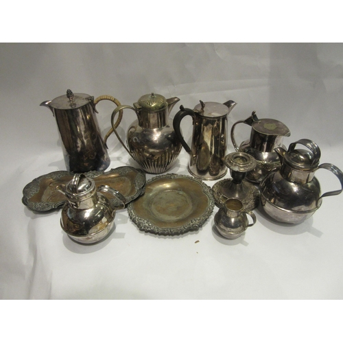 4480 - A box of miscellaneous plated ware to include hot water jug, milk jugs etc