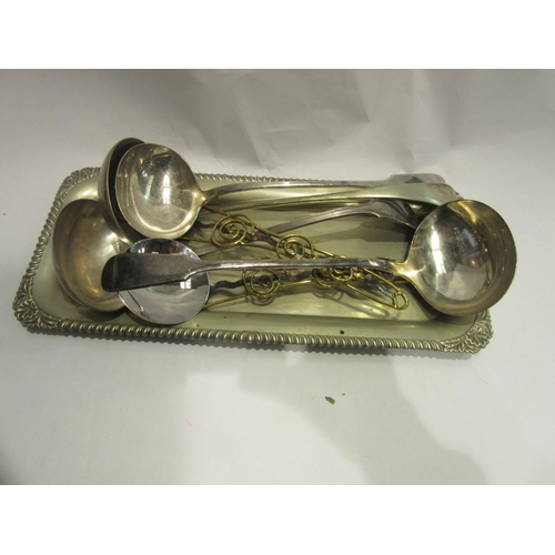 4482 - A plated bread board, EPNS tray, four plated soup ladles , salad servers and a silver on nickel tier... 