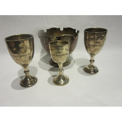 4489 - A group of silver presentation trophies, including Monteith bowl, and three small cups, 227g (4)