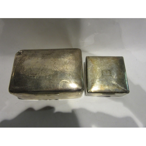 4492 - Two silver cigarette boxes both with dents and wood lined interiors.  6cm x 13.5cm and 3.5cm x 8.5cm... 