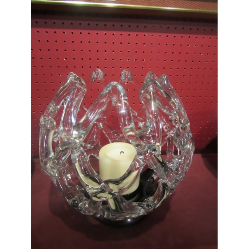 4036 - A large openwork glass globe form candle holder, with box