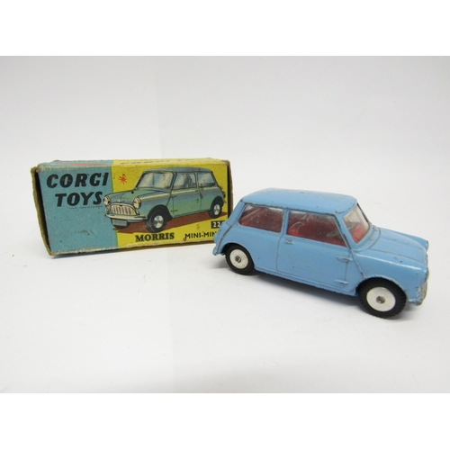 9414 - A boxed Corgi Toys diecast model 226 Morris Mini-Minor in pale blue with red interior and sprung sus... 