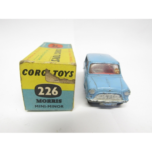 9414 - A boxed Corgi Toys diecast model 226 Morris Mini-Minor in pale blue with red interior and sprung sus... 