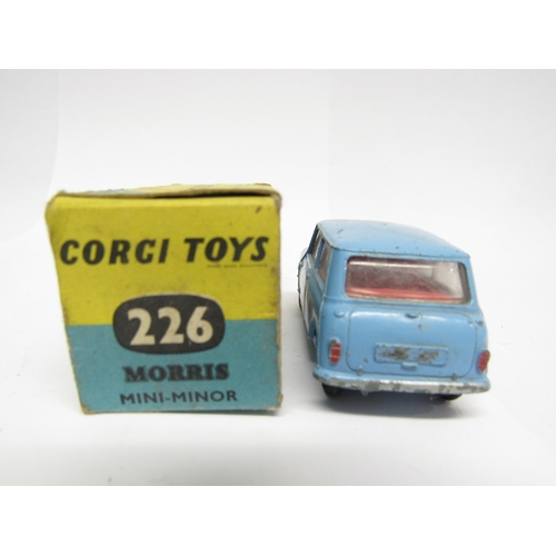 9414 - A boxed Corgi Toys diecast model 226 Morris Mini-Minor in pale blue with red interior and sprung sus... 