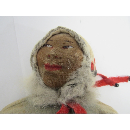 9284 - A vintage Norah Wellings style cloth character doll as an Inuit man, with moulded cloth face with pa... 