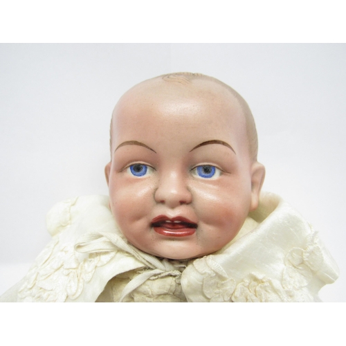 9308 - An early 20th Century WH Goss baby boy doll, bisque head with moulded and painted features, impresse... 