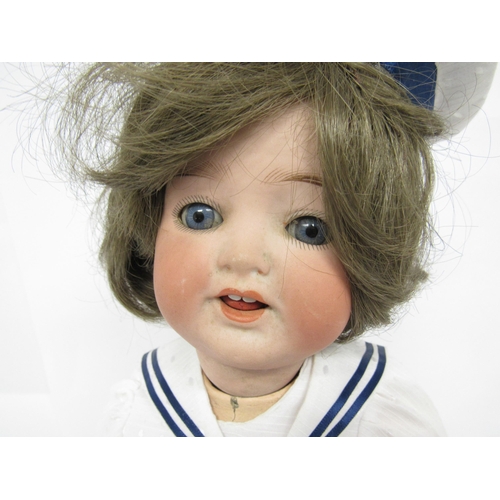 9306 - An early 20th Century Heubach Koppelsdorf bisque head girl doll with brown wig, fixed striated blue ... 