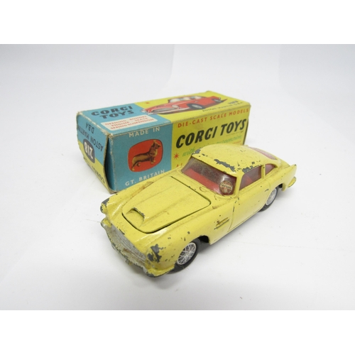 9415 - Three boxed Corgi Toys diecast model cars to include 218 Aston Martin DB4 in yellow with red interio... 