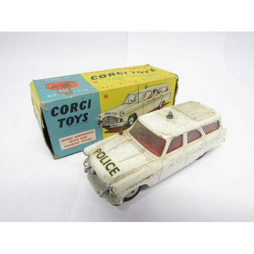 9415 - Three boxed Corgi Toys diecast model cars to include 218 Aston Martin DB4 in yellow with red interio... 