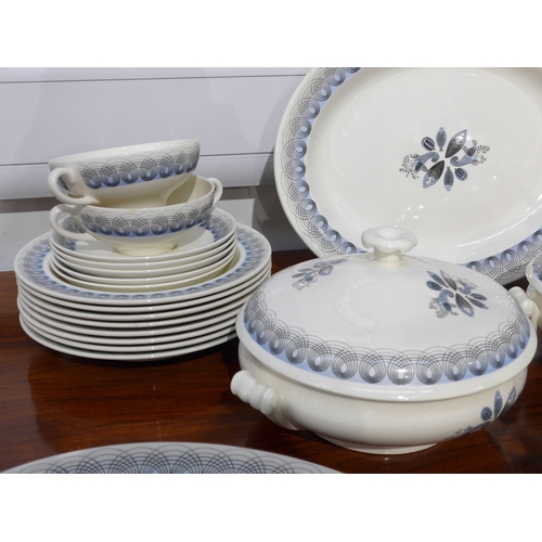 7040 - Eric Ravilious for Wedgwood - A 'Persephone' pattern dinner service in blue colourway, eight place s... 