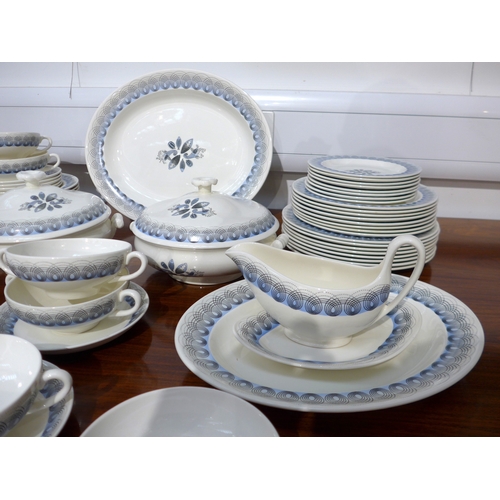 7040 - Eric Ravilious for Wedgwood - A 'Persephone' pattern dinner service in blue colourway, eight place s... 