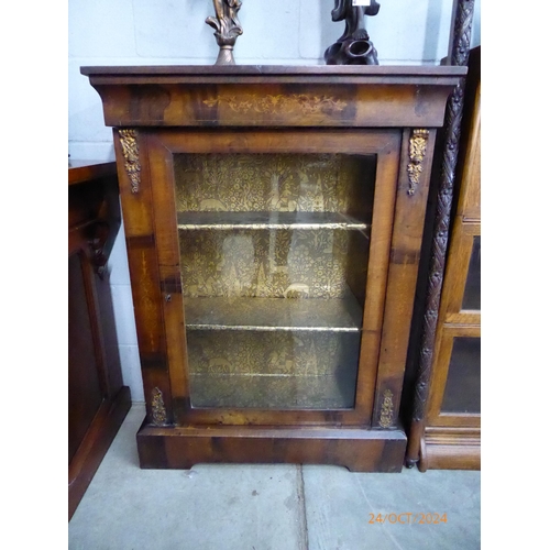 2165 - A Victorian walnut pier cabinet