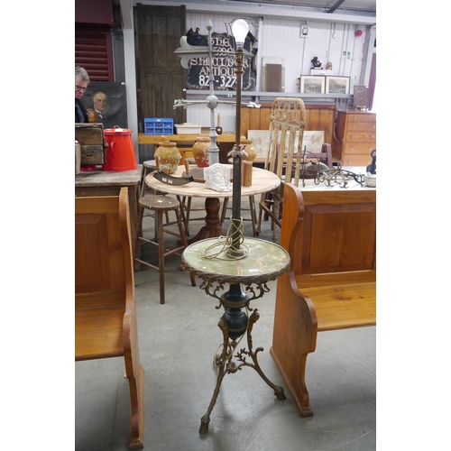 2007 - A mid 20th Century brass and onyx floor lamp with centre table on hoofed feet