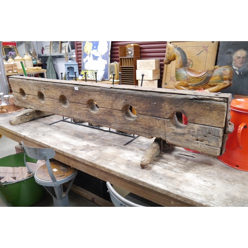 2019 - A set of 17th Century oak and iron three person set of leg stocks