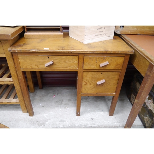 2086 - A mid Century oak single pedestal desk, two drawers to side