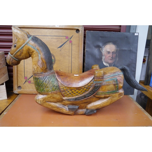 2090 - A carved and painted hardwood rocking horse