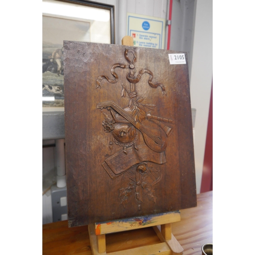 2105 - A 19th Century carved walnut plaque