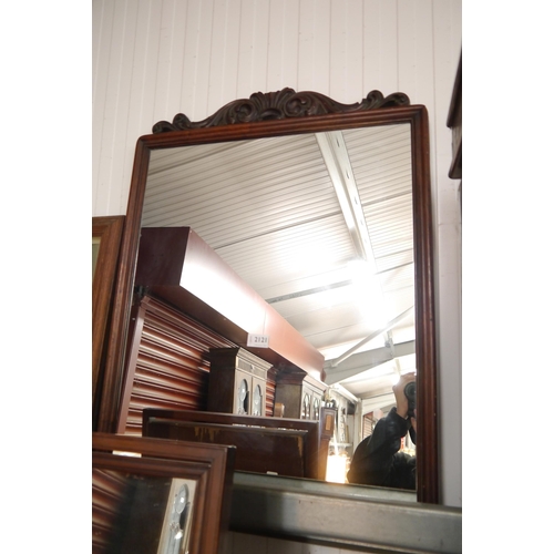 2121 - An early 19th Century rosewood framed mirror with carved crest 61 x 80cm