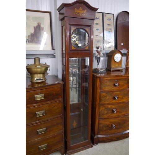 2129 - An inlaid mahogany and bevelled glass clock case with brass mounts to interior , no movement