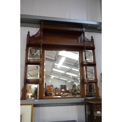 2137 - A late 19th Century walnut framed overmantel mirror with fret carved gallery shelves and multi panel... 