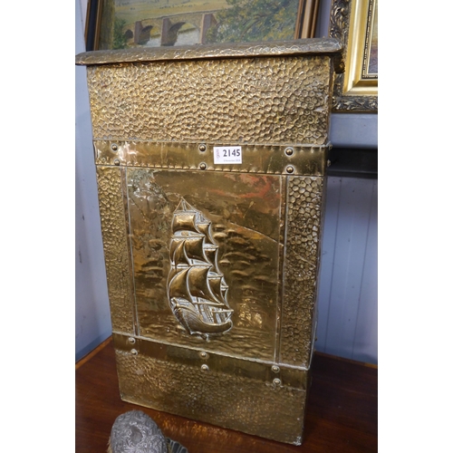 2145 - A brass double section stick stand embossed with gallon and a brass framed mirrored fire screen