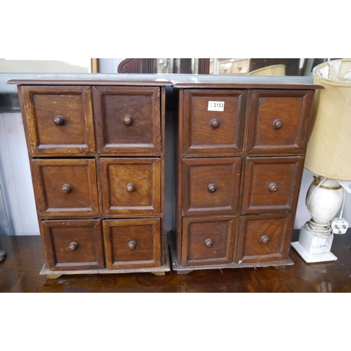 2153 - A pair of six drawer table top chests