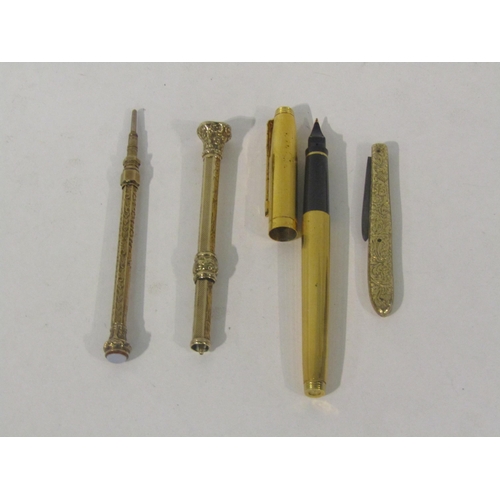 4391 - A Parker fountain pen with 585 gold nib, plated body, engraved pen-knife and two propelling pencils.... 