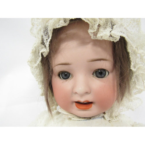 9318 - An early 20th Century Gebruder Ohlhaver Revalo bisque head girl doll with light brown wig, striated ... 