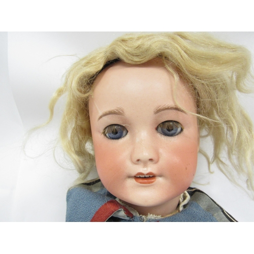 9316 - An early 20th Century French Unis 301 bisque head girl doll, with blonde wig, blue glass sleeping ey... 