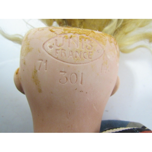 9316 - An early 20th Century French Unis 301 bisque head girl doll, with blonde wig, blue glass sleeping ey... 