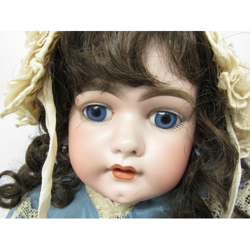 9264 - An early 20th Century Simon & Halbig bisque head girl doll with brown wig, fixed blue glass eyes, ha... 