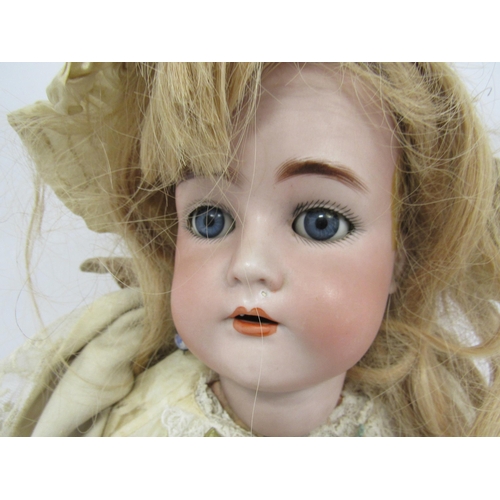 9315 - An early 20th Century Simon & Halbig / Kammer & Reinhardt bisque head girl doll, with blonde wig, st... 