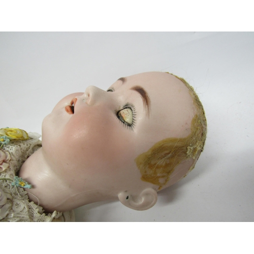 9315 - An early 20th Century Simon & Halbig / Kammer & Reinhardt bisque head girl doll, with blonde wig, st... 