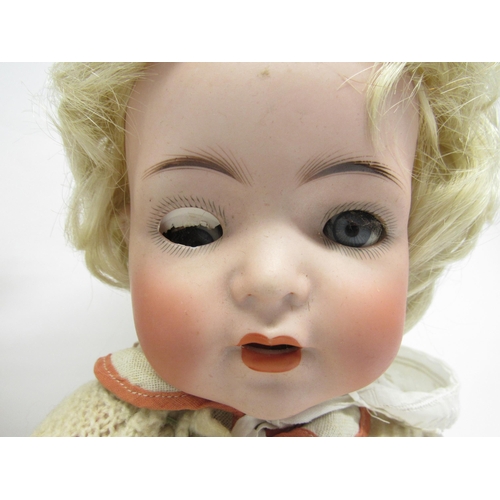 9251 - Two early 20th Century bisque head baby dolls, to include Simon & Halbig 1294 with blue glass sleepi... 