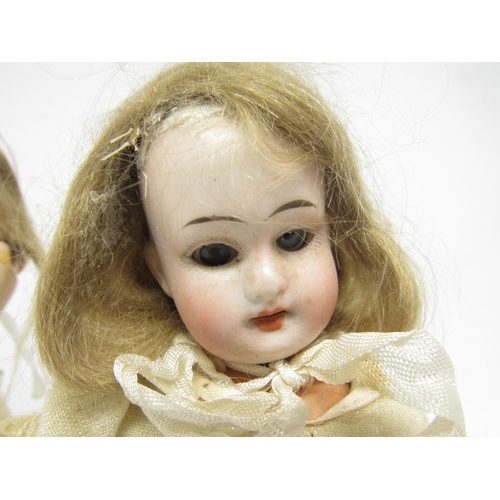 9231 - Two early 20th Century German bisque head dolls to include Heubach Koppelsdorf with fixed blue glass... 