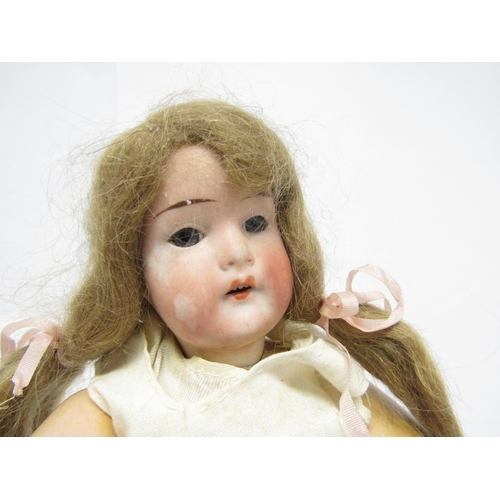 9231 - Two early 20th Century German bisque head dolls to include Heubach Koppelsdorf with fixed blue glass... 