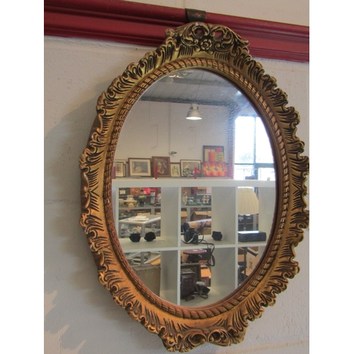 1045 - Two plaster gilt framed wall mirrors