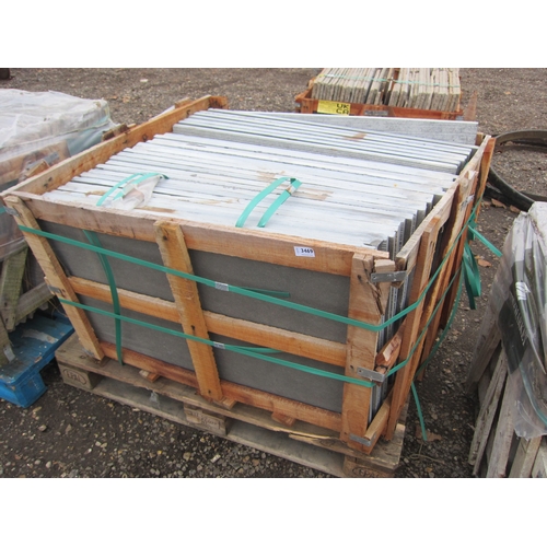 3469 - A pallet of polished stone slabs