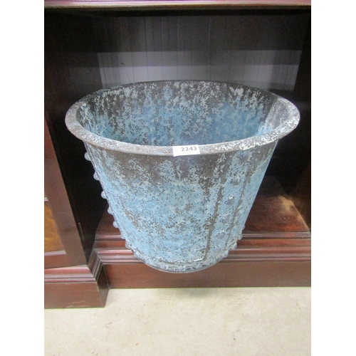 1117 - A verdigris finish metal log bin/planter, 50cm diameter