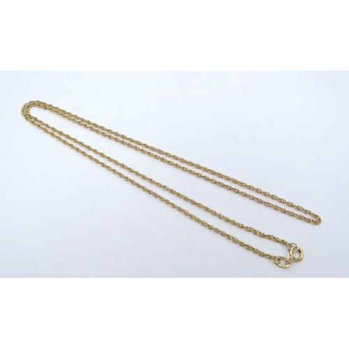 9305 - A 9ct gold fine chain, 48cm long, 2.7g