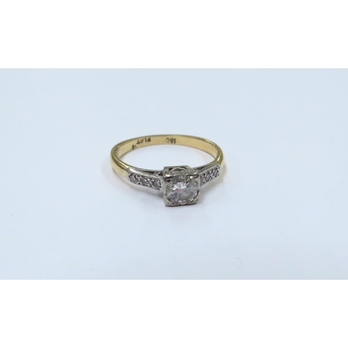 9154 - An 18ct gold platinum set diamond ring, 0.25ct approx with three diamonds set to each shoulder. Size... 