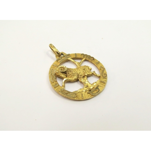 9252 - An 18ct gold Zodiac pendant depicting the Ram 