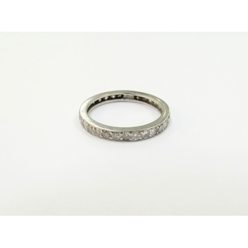 9096 - A diamond eternity ring, resized, unmarked Size N, 2.8g