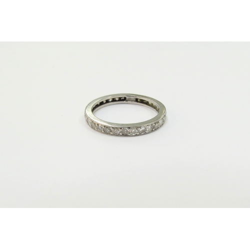 9096 - A diamond eternity ring, resized, unmarked Size N, 2.8g