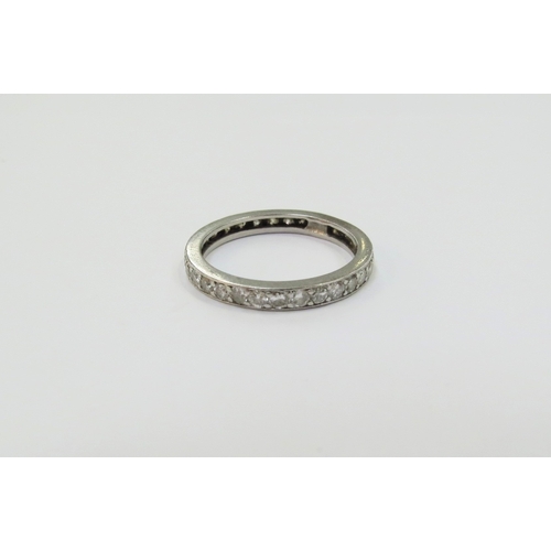 9096 - A diamond eternity ring, resized, unmarked Size N, 2.8g